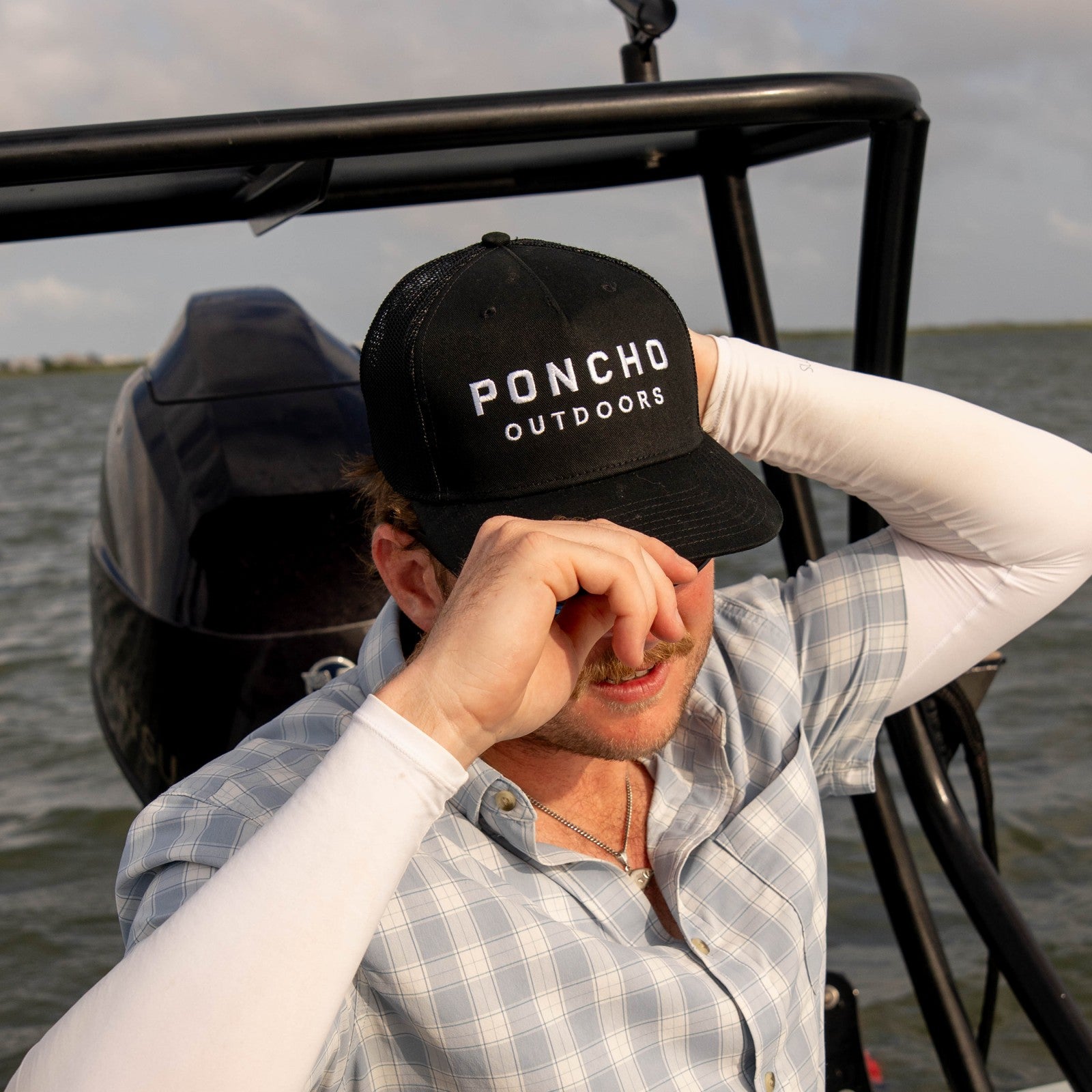 Poncho Outdoors The Man in Black Hat