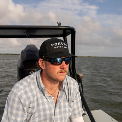 Poncho Outdoors The Man in Black Hat